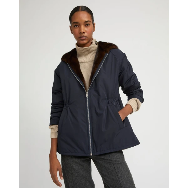 Woman wearing Yves Salomon shearling fur coat – luxury outerwear at Luxury Shoes 