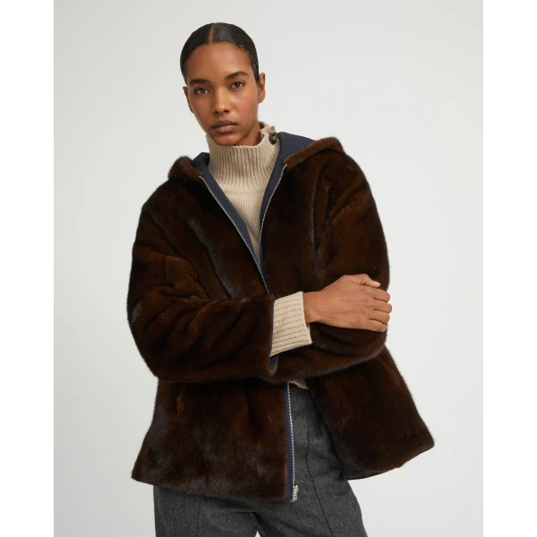 Woman wearing Yves Salomon shearling fur coat – luxury outerwear at Luxury Shoes 