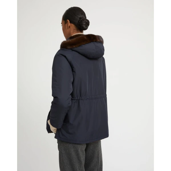 Woman wearing Yves Salomon shearling fur coat – luxury outerwear at Luxury Shoes 