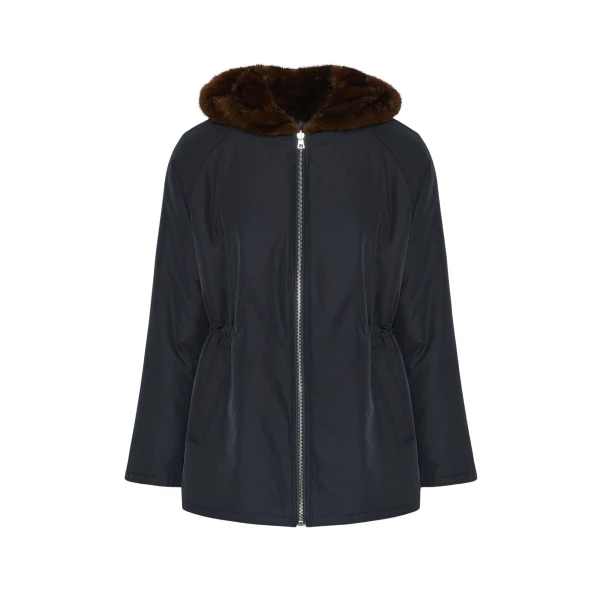 Woman wearing Yves Salomon shearling fur coat – luxury outerwear at Luxury Shoes 