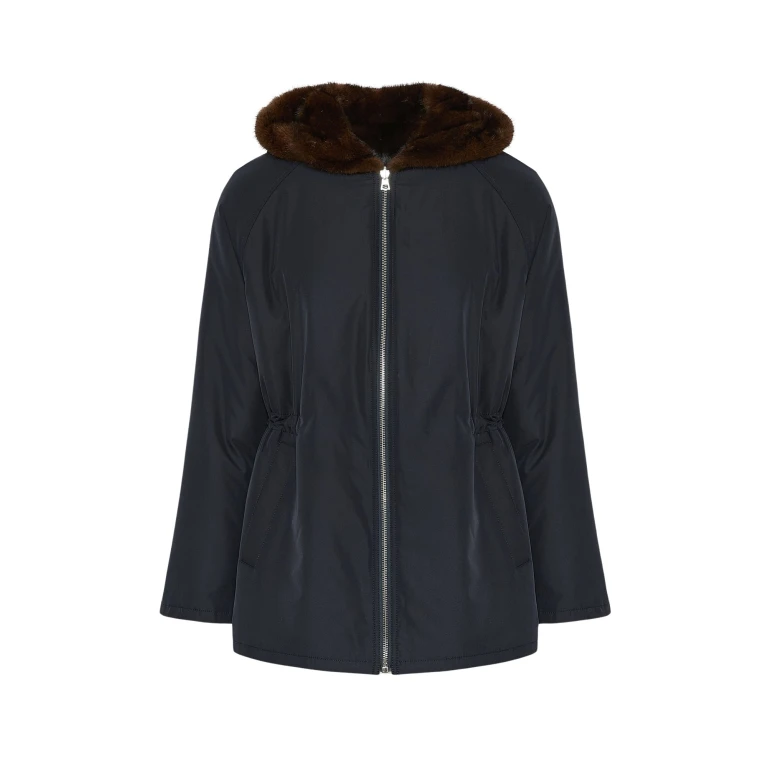 Woman wearing Yves Salomon shearling fur coat – luxury outerwear at Luxury Shoes 