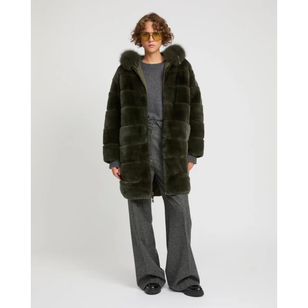 Woman wearing Yves Salomon shearling fur coat – luxury outerwear at Luxury Shoes 