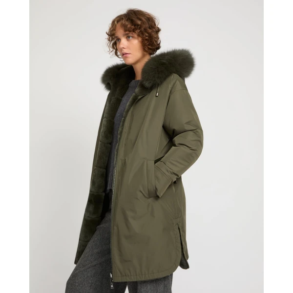 Woman wearing Yves Salomon shearling fur coat – luxury outerwear at Luxury Shoes 