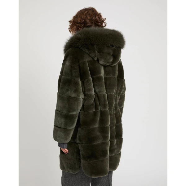 Woman wearing Yves Salomon shearling fur coat – luxury outerwear at Luxury Shoes 