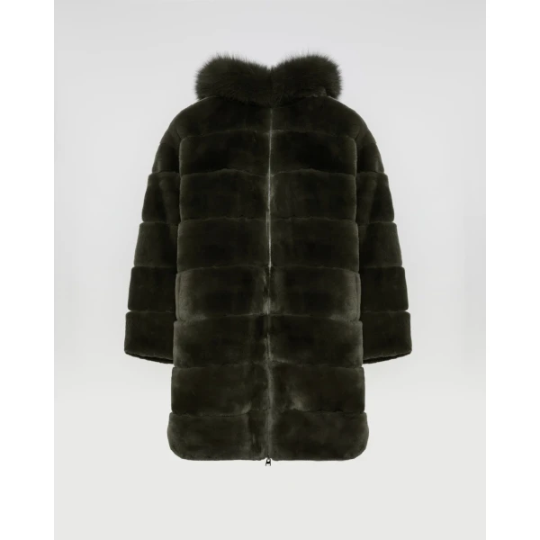 Woman wearing Yves Salomon shearling fur coat – luxury outerwear at Luxury Shoes 