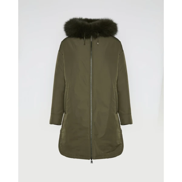 Woman wearing Yves Salomon shearling fur coat – luxury outerwear at Luxury Shoes 