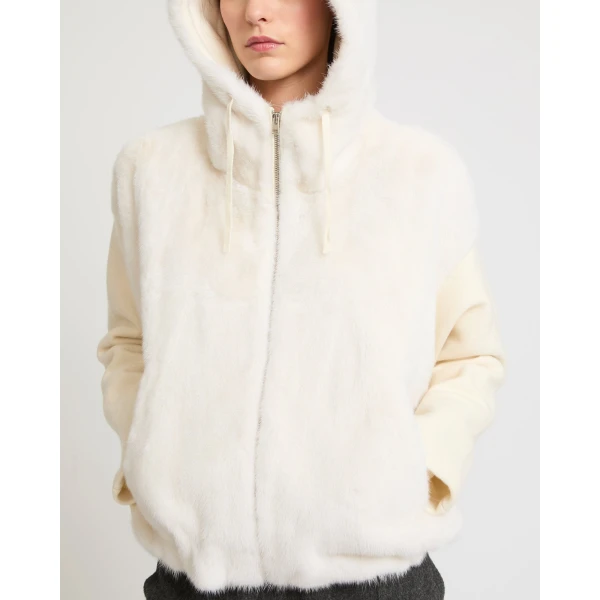 Woman wearing Yves Salomon shearling fur coat – luxury outerwear at Luxury Shoes 