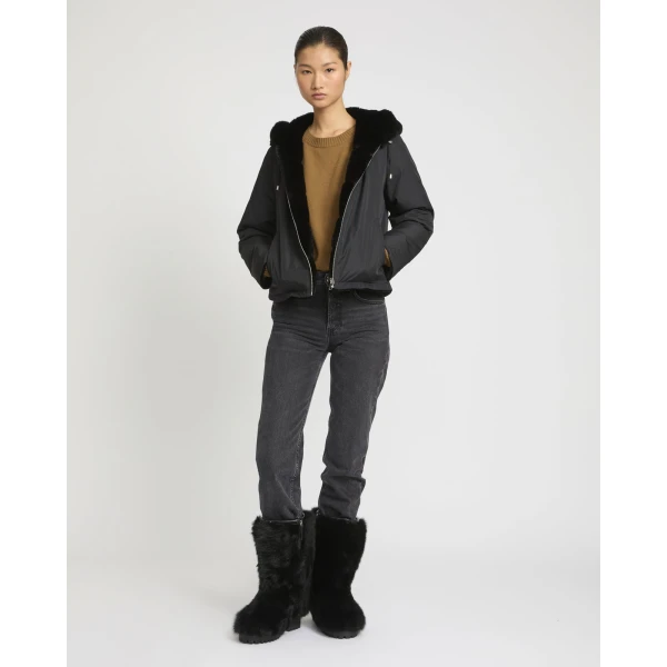 Woman wearing Yves Salomon shearling fur coat – luxury outerwear at Luxury Shoes 