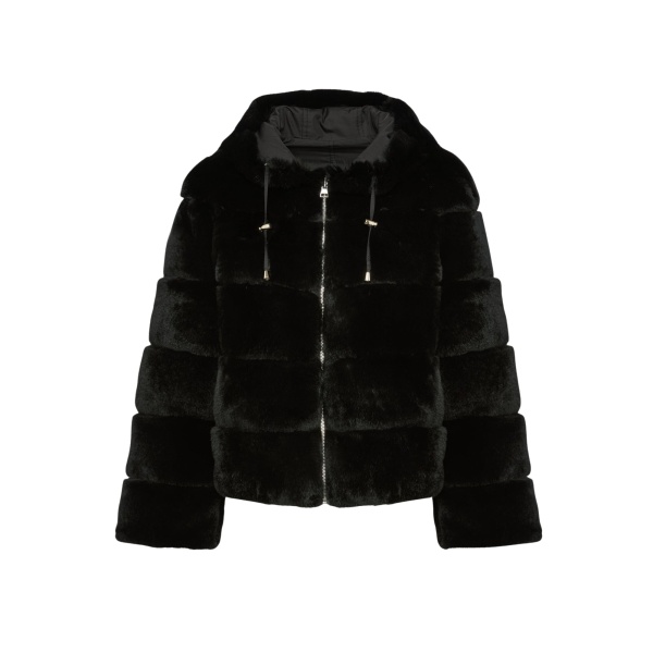 Woman wearing Yves Salomon shearling fur coat – luxury outerwear at Luxury Shoes 