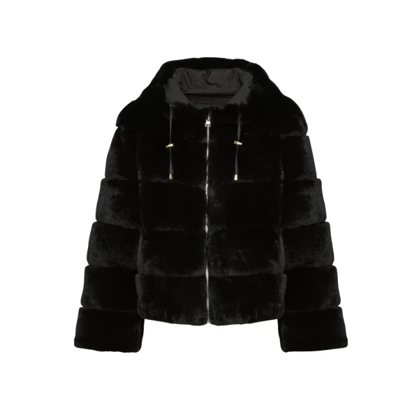 Woman wearing Yves Salomon shearling fur coat – luxury outerwear at Luxury Shoes 