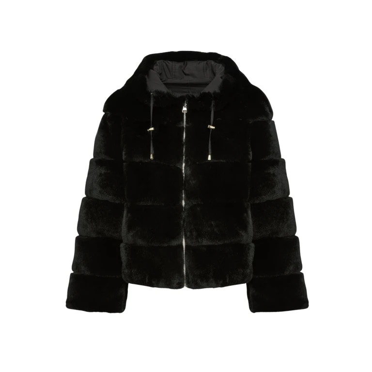 Woman wearing Yves Salomon shearling fur coat – luxury outerwear at Luxury Shoes 