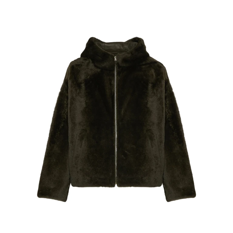 Woman wearing Yves Salomon shearling fur coat – luxury outerwear at Luxury Shoes 
