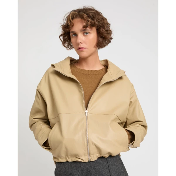 Woman wearing Yves Salomon shearling fur coat – luxury outerwear at Luxury Shoes 