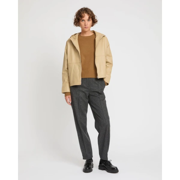 Woman wearing Yves Salomon shearling fur coat – luxury outerwear at Luxury Shoes 