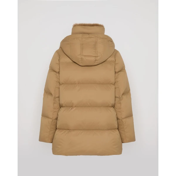 Woman wearing Yves Salomon shearling fur coat – luxury outerwear at Luxury Shoes 