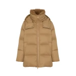 Woman wearing Yves Salomon shearling fur coat – luxury outerwear at Luxury Shoes 