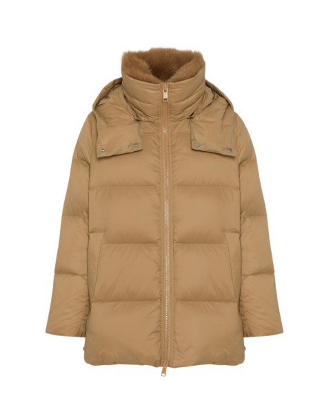 Woman wearing Yves Salomon shearling fur coat – luxury outerwear at Luxury Shoes 