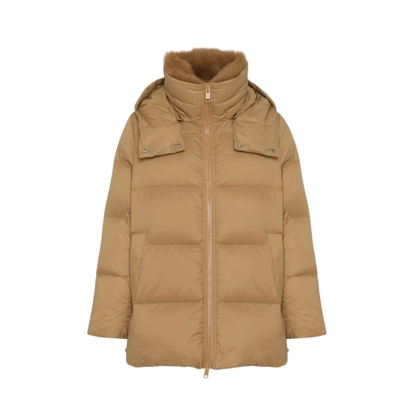 Woman wearing Yves Salomon shearling fur coat – luxury outerwear at Luxury Shoes 