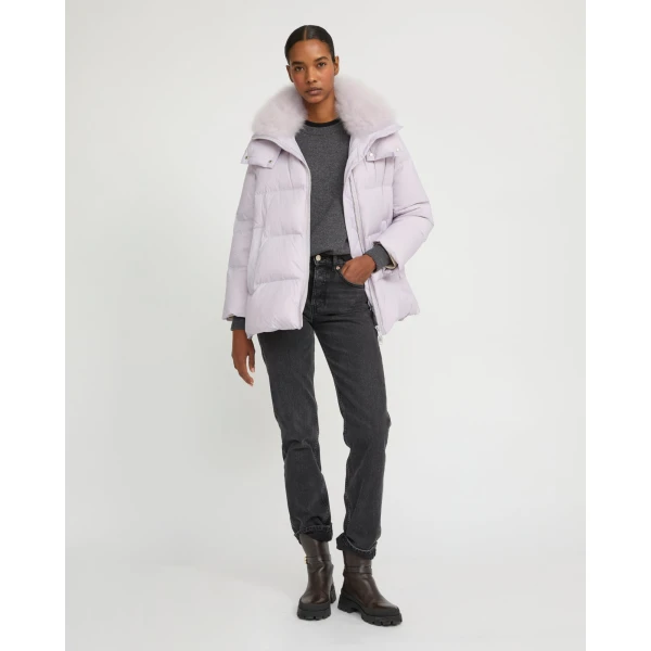 Woman wearing Yves Salomon shearling fur coat – luxury outerwear at Luxury Shoes 