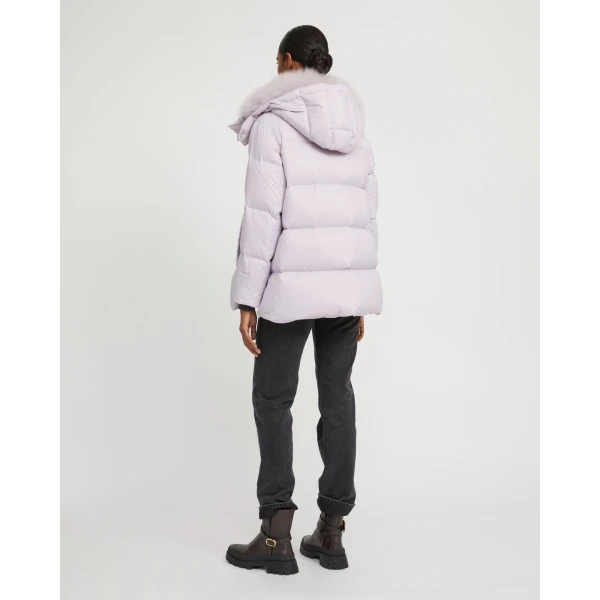 Woman wearing Yves Salomon shearling fur coat – luxury outerwear at Luxury Shoes 