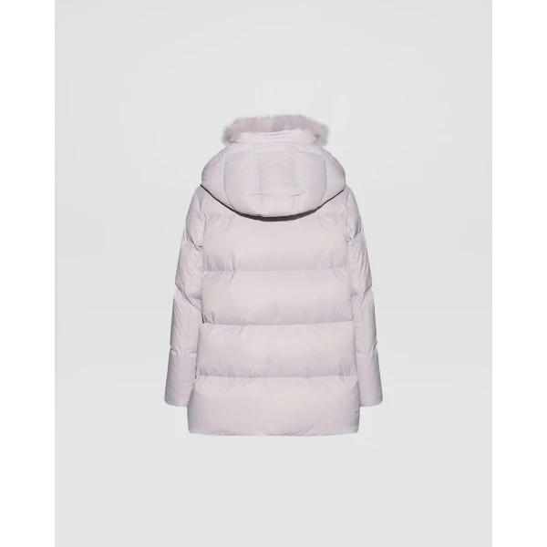 Woman wearing Yves Salomon shearling fur coat – luxury outerwear at Luxury Shoes 