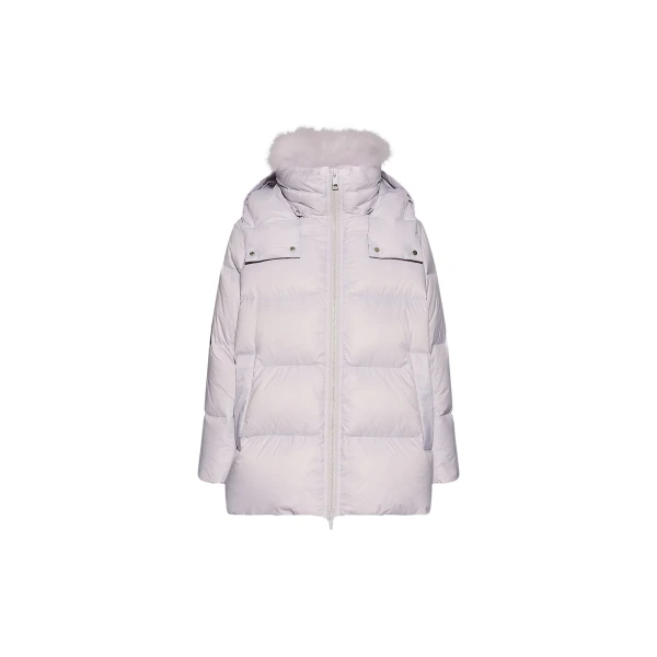 Woman wearing Yves Salomon shearling fur coat – luxury outerwear at Luxury Shoes 