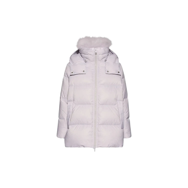 Woman wearing Yves Salomon shearling fur coat – luxury outerwear at Luxury Shoes 