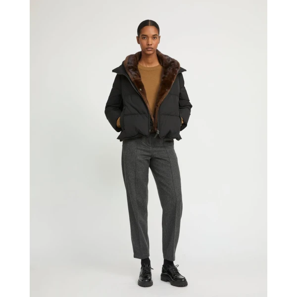 Woman wearing Yves Salomon shearling fur coat – luxury outerwear at Luxury Shoes 