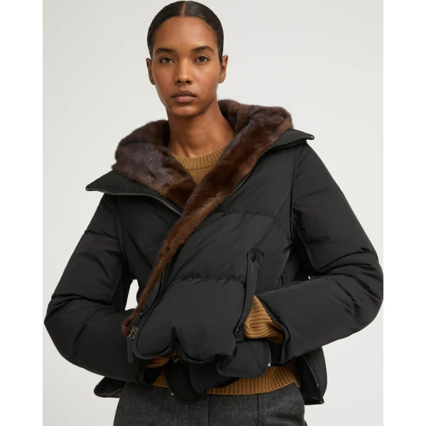Woman wearing Yves Salomon shearling fur coat – luxury outerwear at Luxury Shoes 