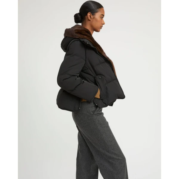 Woman wearing Yves Salomon shearling fur coat – luxury outerwear at Luxury Shoes 