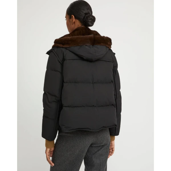Woman wearing Yves Salomon shearling fur coat – luxury outerwear at Luxury Shoes 