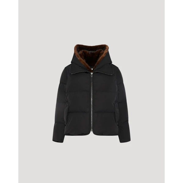 Woman wearing Yves Salomon shearling fur coat – luxury outerwear at Luxury Shoes 