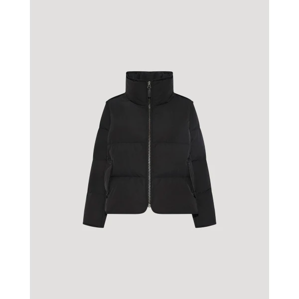 Woman wearing Yves Salomon shearling fur coat – luxury outerwear at Luxury Shoes 