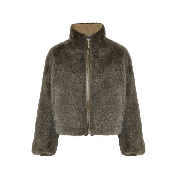 Woman wearing Yves Salomon shearling fur coat – luxury outerwear at Luxury Shoes 