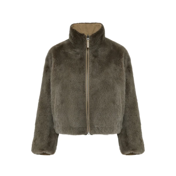 Woman wearing Yves Salomon shearling fur coat – luxury outerwear at Luxury Shoes 