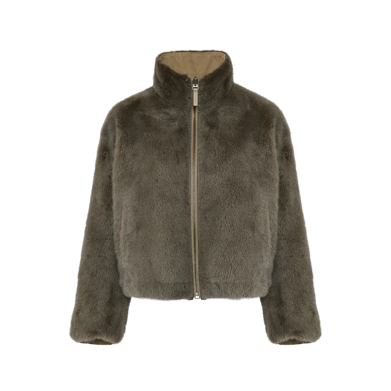 Woman wearing Yves Salomon shearling fur coat – luxury outerwear at Luxury Shoes 