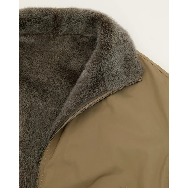 Woman wearing Yves Salomon shearling fur coat – luxury outerwear at Luxury Shoes 