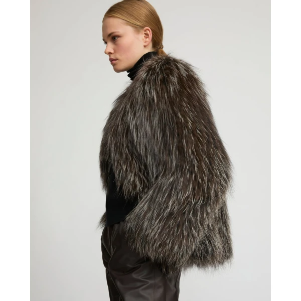 Woman wearing Yves Salomon shearling fur coat – luxury outerwear at Luxury Shoes 