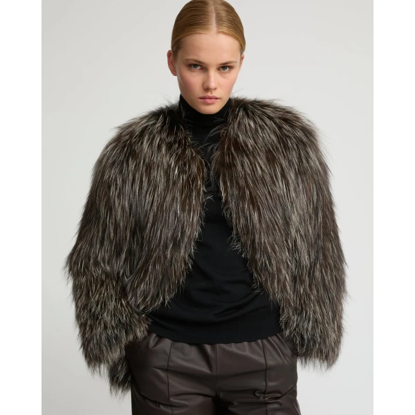 Woman wearing Yves Salomon shearling fur coat – luxury outerwear at Luxury Shoes 