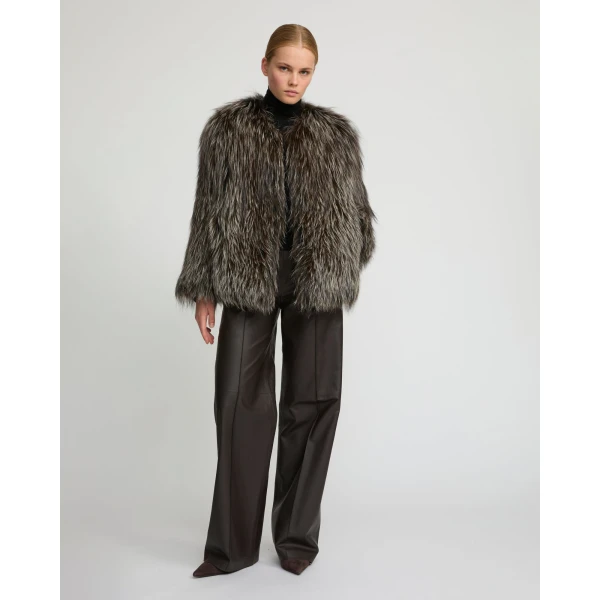 Woman wearing Yves Salomon shearling fur coat – luxury outerwear at Luxury Shoes 