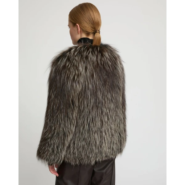 Woman wearing Yves Salomon shearling fur coat – luxury outerwear at Luxury Shoes 