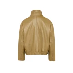 Woman wearing Yves Salomon shearling fur coat – luxury outerwear at Luxury Shoes 