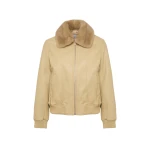 Woman wearing Yves Salomon shearling fur coat – luxury outerwear at Luxury Shoes 