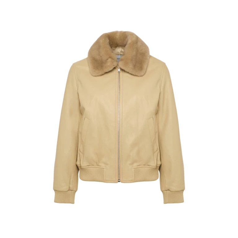 Woman wearing Yves Salomon shearling fur coat – luxury outerwear at Luxury Shoes 
