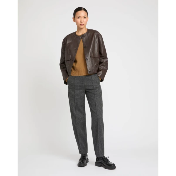 Woman wearing Yves Salomon shearling fur coat – luxury outerwear at Luxury Shoes 