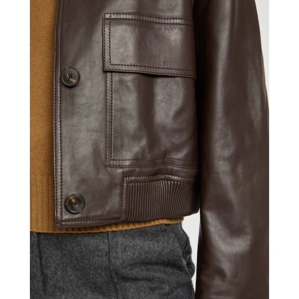 Woman wearing Yves Salomon shearling fur coat – luxury outerwear at Luxury Shoes 