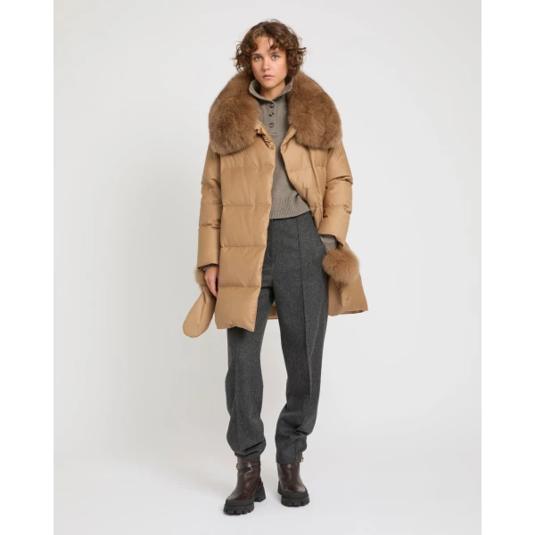 Woman wearing Yves Salomon shearling fur coat – luxury outerwear at Luxury Shoes 
