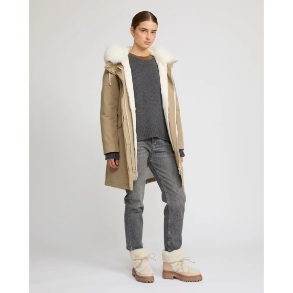 Woman wearing Yves Salomon shearling fur coat – luxury outerwear at Luxury Shoes 