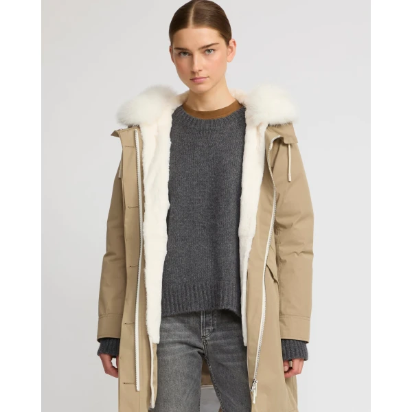 Woman wearing Yves Salomon shearling fur coat – luxury outerwear at Luxury Shoes 