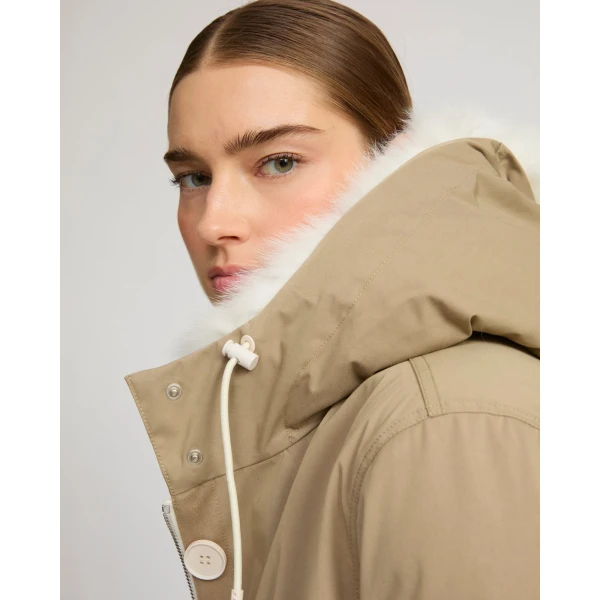 Woman wearing Yves Salomon shearling fur coat – luxury outerwear at Luxury Shoes 